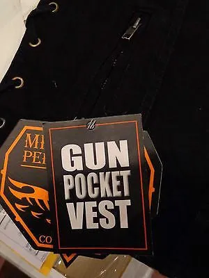 WOMEN'S MOTORCYCLE BLACK 6 POCKET DENIM VEST WITH SIDE LACES TWO GUN POCKETS